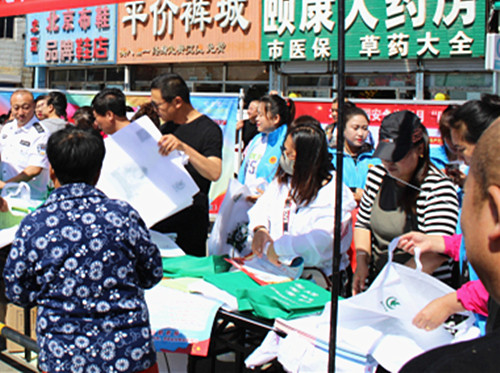 1560841269848386.jpg 残疾人宣传现场一角.jpg